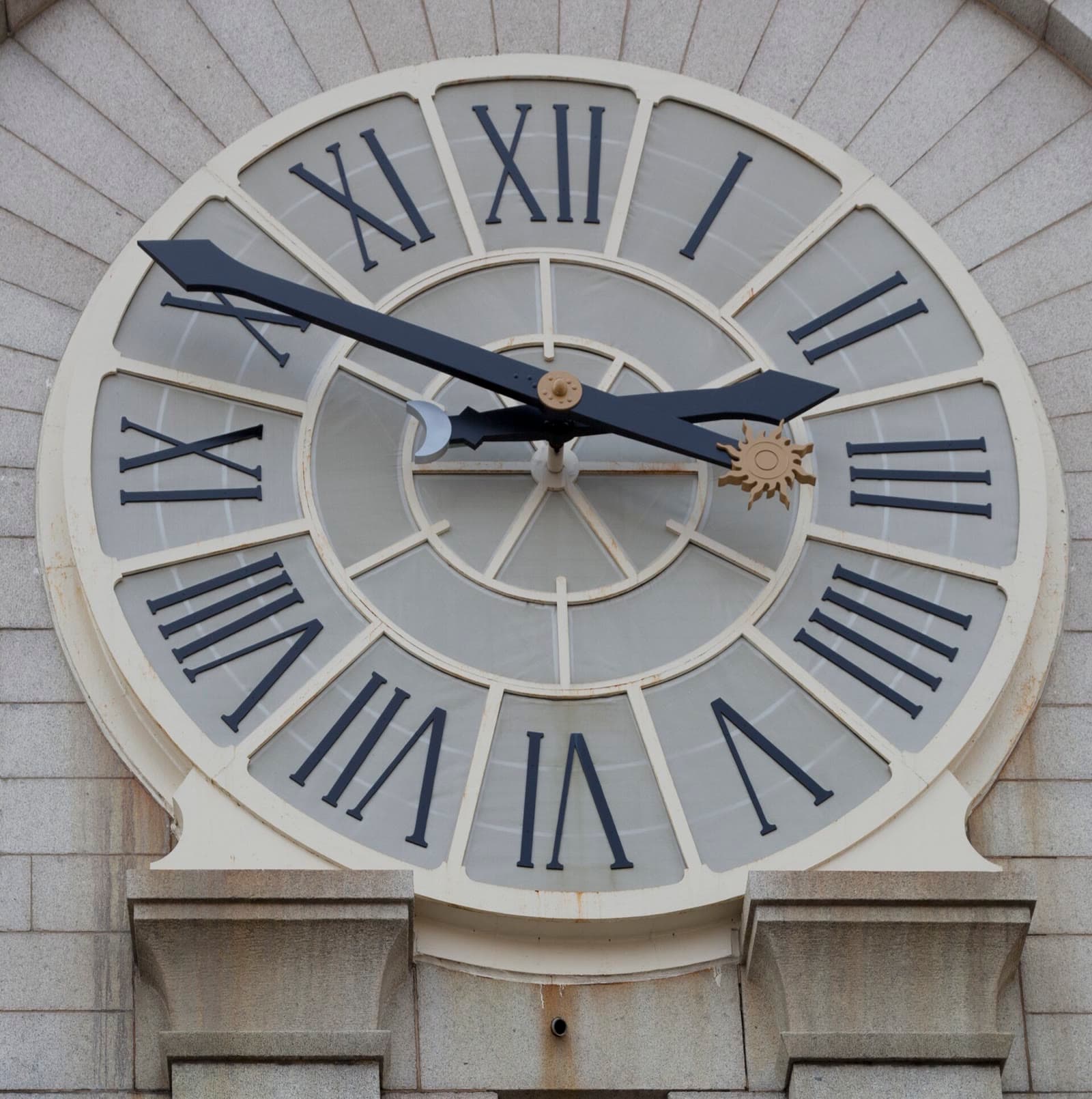 The clock face on the Old Post Office tower on Pennsylvania Avenue in Washington, D.C., with a sun on one hand and a moon on the other (file photo)