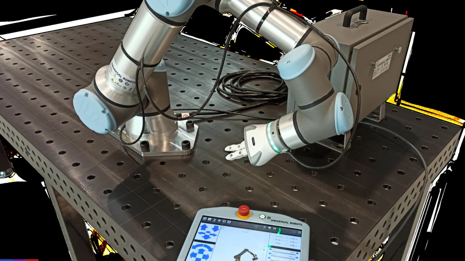 A collaborative industrial robot arm on a workbench