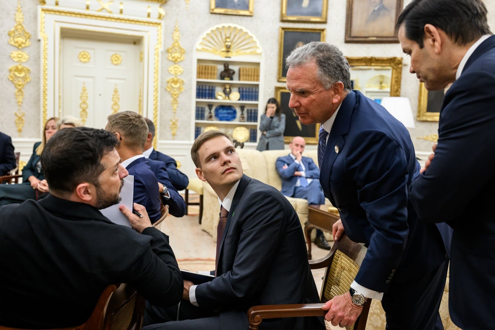 Ukrainian President Volodymyr Zelenskyy speaks with Special Envoy Steve Witkoff and Secretary of State Marco Rubio in the Oval Office in August 2025